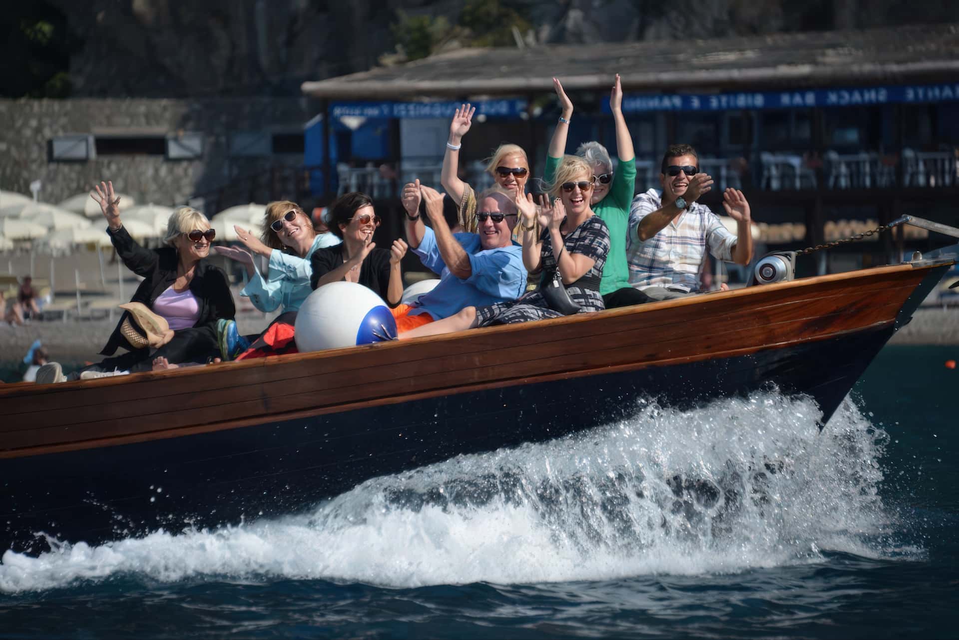 Group boating on the Amalfi Coast in Italy in private traditional boats